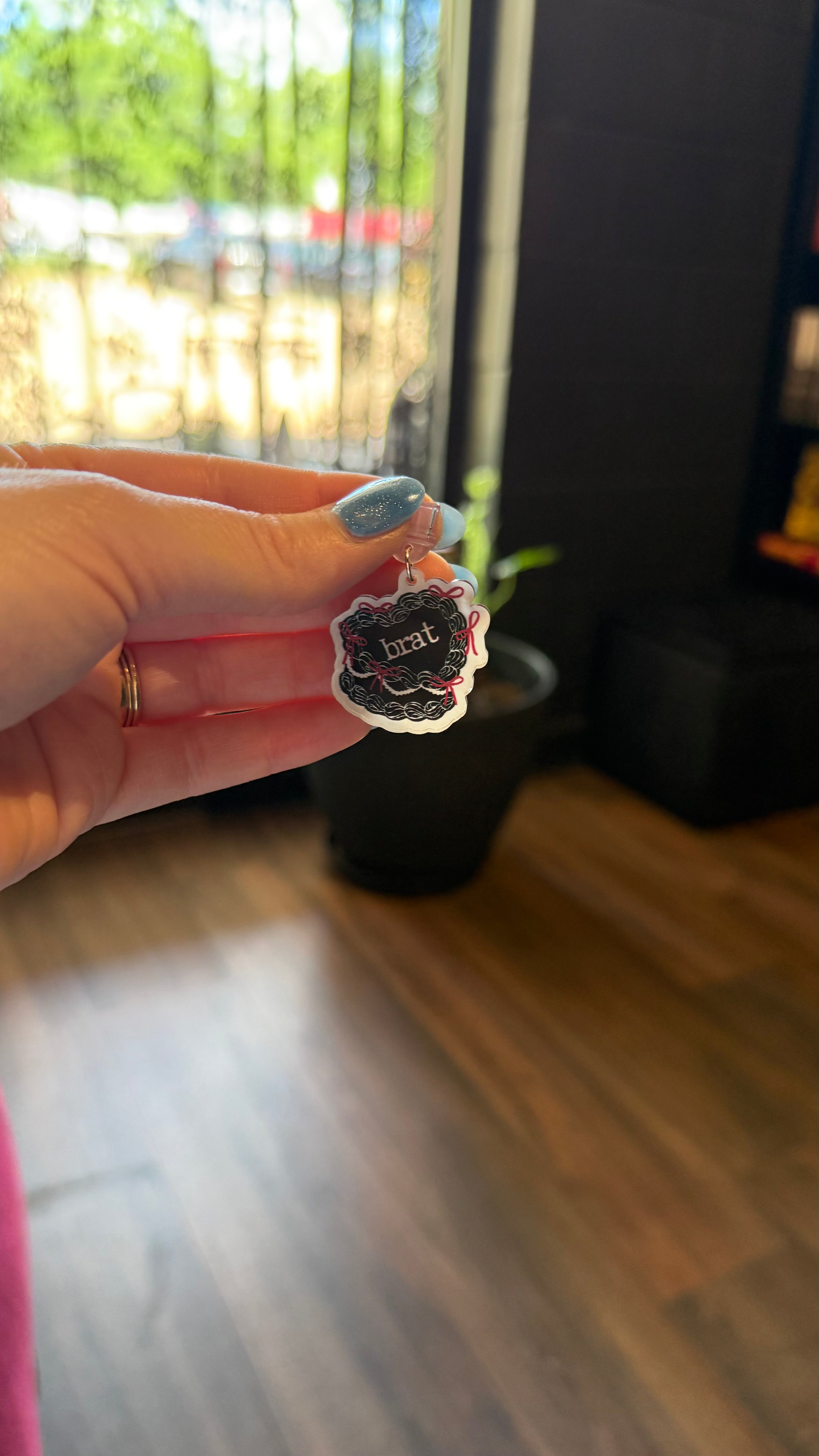 Brat Kindle Charm