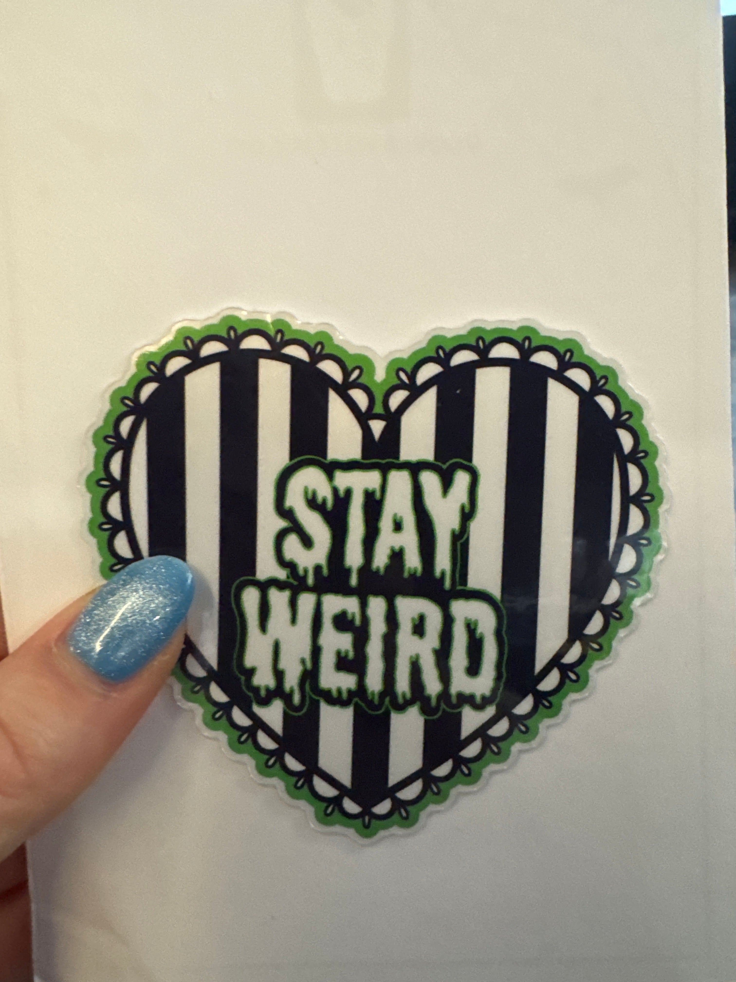 Stay Weird sticker