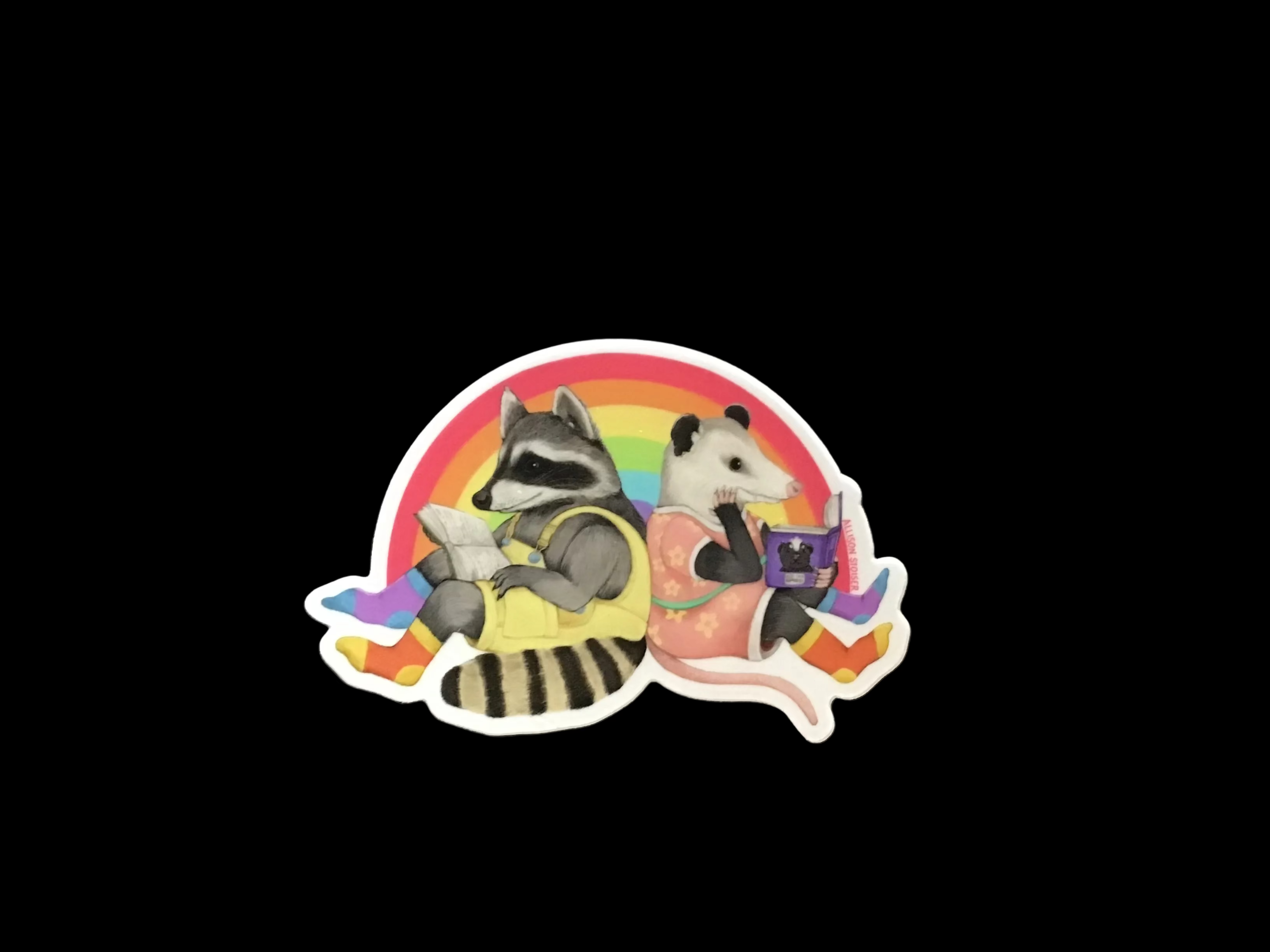 Raccoon and Opossum reading
